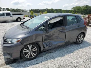 2015 Honda Fit EX-L z VIN 3HGGK5H81FM736940, wystawiony jako Copart lot #59015485 z przebiegiem 73 326 mil mil oraz Szkoda całkowita • Salvage title. Historia ofert i sprzedaży dostępna na DreamBid. Obrazek 1.