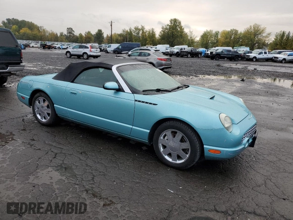 2002 Ford Thunderbird Hardtop Premium with VIN 1FAHP60A02Y121714, listed as a Copart auction lot 77852994 with 132,049 mi miles and Salvage Title. Bid and sale history available at DreamBid. Image 4.