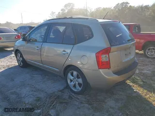 2007 Kia Rondo LX with VIN KNAFG526977114033, listed as a IAAI auction lot 40967531 with 126,761 mi miles. Bid and sale history available at carsss.com. Image 3.
