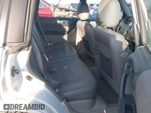 2002 Subaru Forester S w/Premium Pkg with VIN JF1SF65662H739973, listed as a IAAI auction lot 41731564 with 122,452 mi miles. Bid and sale history available at carsss.com. Image 8.