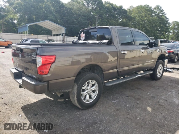 2017 Nissan Titan XD SL with VIN 1N6BA1F44HN510174, listed as a Copart auction lot 63245694 with 121,868 mi miles and Salvage Title. Bid and sale history available at carsss.com. Image 3.