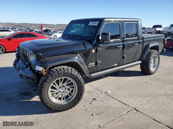 2023 Jeep Gladiator Overland with VIN 1C6HJTFG2PL559314, listed as a Copart auction lot 87530945 with 9,434 mi miles and Salvage Title. Bid and sale history available at carsss.com. Image 1.
