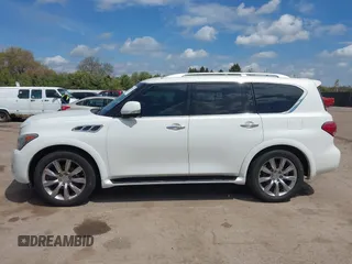 2013 Infiniti QX56 z VIN JN8AZ2NE1D9042676, wystawiony jako IAAI lot #42181659 z przebiegiem 113 454 mil mil oraz . Historia ofert i sprzedaży dostępna na DreamBid. Obrazek 14.