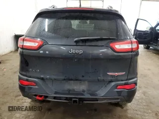 2015 Jeep Cherokee Trailhawk z VIN 1C4PJMBS0FW598694, wystawiony jako Copart lot #60731615 z przebiegiem 130 219 mil mil oraz Czysty tytuł • Clean title. Historia ofert i sprzedaży dostępna na DreamBid. Obrazek 6.