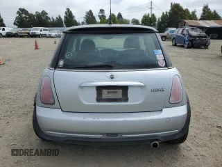 2005 MINI Hardtop with VIN WMWRC335X5TJ70165, listed as a Copart auction lot 53918445 with 145,572 mi miles and Salvage title. Bid and sale history available at DreamBid. Image 6.