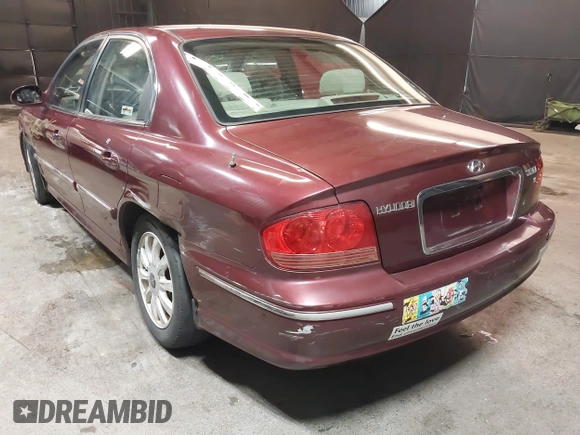 2003 Hyundai Sonata GLS with VIN KMHWF35H13A882475, listed as a IAAI auction lot 41863570 with 168,303 mi miles. Bid and sale history available at carsss.com. Image 3.
