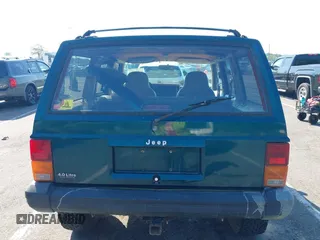 1995 Jeep Cherokee Sport z VIN 1J4FJ68S7SL623451, wystawiony jako IAAI lot #42581407 z przebiegiem 160 581 mil mil oraz . Historia ofert i sprzedaży dostępna na DreamBid. Obrazek 16.