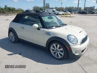 2013 MINI Convertible S with VIN WMWZP3C51DT297843, listed as a IAAI auction lot 41527353 with 127,827 mi miles and . Bid and sale history available at DreamBid. Image 1.