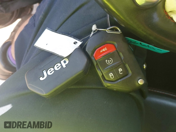2021 Jeep Wrangler Unlimited Rubicon with VIN 1C4HJXFN5MW509483, listed as a IAAI auction lot 42245703 with 59,461 mi miles and . Bid and sale history available at DreamBid. Image 11.