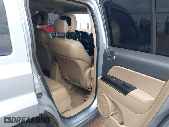 2013 Jeep Patriot Limited with VIN 1C4NJRCB7DD228595, listed as a IAAI auction lot 42537471 with 122,987 mi miles and . Bid and sale history available at DreamBid. Image 8.