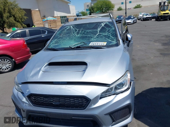 2018 Subaru WRX z VIN JF1VA1A6XJ9811349, wystawiony jako IAAI lot #42283407 z przebiegiem 64 292 mil mil oraz . Historia ofert i sprzedaży dostępna na DreamBid. Obrazek 6.