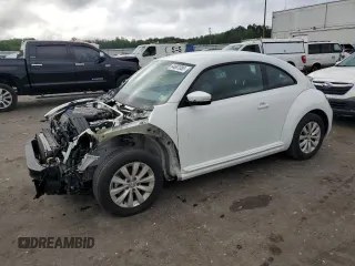 2019 Volkswagen Beetle S with VIN 3VWFD7AT8KM710373, listed as a Copart auction lot 64687085 with 54,632 mi miles and Salvage title. Bid and sale history available at DreamBid. Image 1.