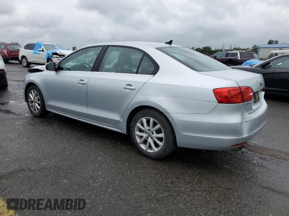 2013 Volkswagen Jetta SE with VIN 3VWDP7AJ9DM448489, listed as a Copart auction lot 62683725 with 178,931 mi miles and Salvage title. Bid and sale history available at DreamBid. Image 2.