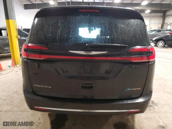 2023 Chrysler Pacifica Hybrid Touring L with VIN 2C4RC1L73PR631113, listed as a Copart auction lot 51678545 with 51,023 mi miles and Clean Title. Bid and sale history available at carsss.com. Image 6.