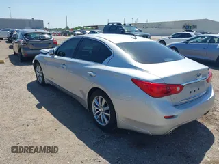 2015 Infiniti Q50 with VIN JN1BV7AR3FM405659, listed as a IAAI auction lot 41949596 with 101,196 mi miles and . Bid and sale history available at DreamBid. Image 3.