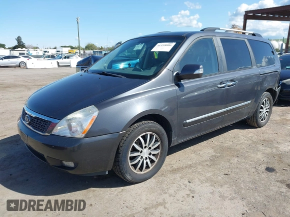 2012 Kia Sedona EX with VIN KNDMH4C79C6465307, listed as a IAAI auction lot 41958886 with 146,130 mi miles. Bid and sale history available at carsss.com. Image 18.