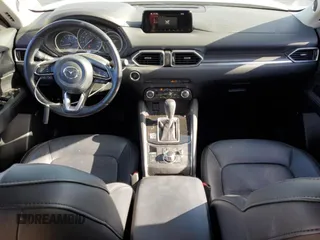 2018 Mazda CX-5 Grand Touring with VIN JM3KFADM8J1330353, listed as a Copart auction lot 54752325 with 96,577 mi miles and Salvage Title. Bid and sale history available at DreamBid. Image 8.