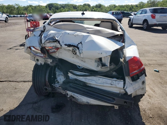 2014 Volkswagen Passat SE z VIN 1VWBN7A30EC022997, wystawiony jako Copart lot #57582285 z przebiegiem 94 920 mil mil oraz Szkoda całkowita • Salvage title. Historia ofert i sprzedaży dostępna na DreamBid. Obrazek 6.