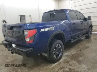 2024 Nissan Titan SV with VIN 1N6AA1FB2RN104714, listed as a Copart auction lot 56576955 with 25,800 mi miles and Salvage title. Bid and sale history available at DreamBid. Image 3.