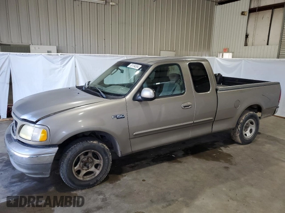 2003 Ford F-150 XL with VIN 1FTRX17283NA46215, listed as a Copart auction lot 85194094 with 168,415 mi miles and Salvage title. Bid and sale history available at DreamBid. Image 1.