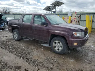 2010 Honda Ridgeline RT with VIN 5FPYK1F23AB008602, listed as a Copart auction lot 52180695 with 144,878 mi miles and Salvage Title. Bid and sale history available at carsss.com. Image 4.