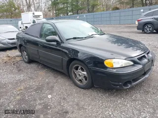 2004 Pontiac Grand Am GT with VIN 1G2NW52E84M651292, listed as a IAAI auction lot 41726143 with 137,296 mi miles. Bid and sale history available at carsss.com. Image 1.