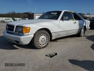 1990 Mercedes-Benz 560 with VIN WDBCA45E6LA553870, listed as a Copart auction lot 51666665 with 228,119 mi miles and Clean Title. Bid and sale history available at DreamBid. Image 1.
