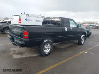 1999 Dodge Ram 1500 with VIN 3B7HF13Z4XM579695, listed as a IAAI auction lot 41795036 with 117,785 mi miles. Bid and sale history available at carsss.com. Image 4.