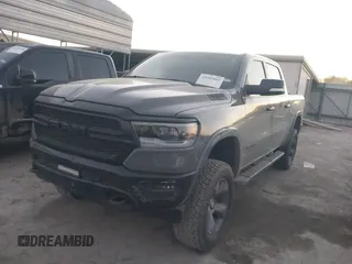 2020 Ram 1500 Big Horn with VIN 1C6SRFFT0LN380054, listed as a IAAI auction lot 41082003 with 112,434 mi miles and . Bid and sale history available at DreamBid. Image 2.