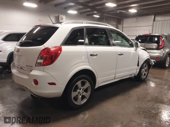 2014 Chevrolet Captiva Sport LT z VIN 3GNAL3EK8ES582752, wystawiony jako IAAI lot #40593238 z przebiegiem 224 027 mil mil oraz . Historia ofert i sprzedaży dostępna na DreamBid. Obrazek 4.