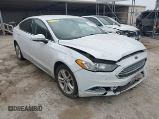 2018 Ford Fusion SE z VIN 3FA6P0HD1JR191576, wystawiony jako IAAI lot #42282669 z przebiegiem 73 439 mil mil oraz . Historia ofert i sprzedaży dostępna na DreamBid. Obrazek 1.