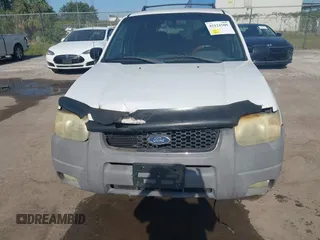 2002 Ford Escape XLT Choice with VIN 1FMYU03132KD02414, listed as a IAAI auction lot 42121509 with 218,148 mi miles and . Bid and sale history available at DreamBid. Image 6.