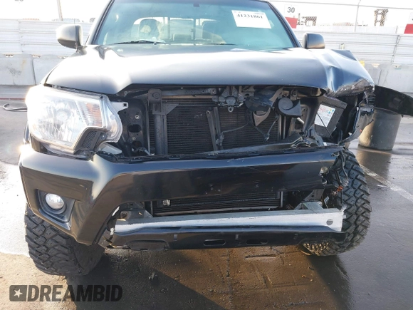 2013 Toyota Tacoma PreRunner z VIN 3TMJU4GN0DM143065, wystawiony jako IAAI lot #41231861 z przebiegiem 139 156 mil mil oraz . Historia ofert i sprzedaży dostępna na DreamBid. Obrazek 12.
