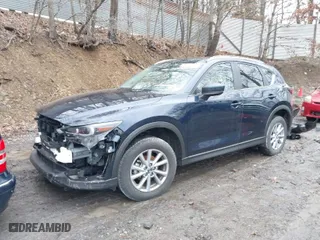 2023 Mazda CX-5 2.5 S Carbon Edition with VIN JM3KFBCM3P0244020, listed as a IAAI auction lot 41693880 with 26,342 mi miles. Bid and sale history available at carsss.com. Image 2.
