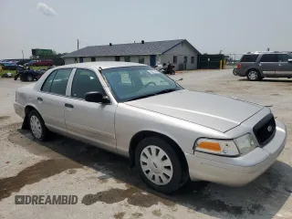 2010 Ford Police Interceptor with VIN 2FABP7BV2AX126536, listed as a Copart auction lot 60327535 with 138,759 mi miles and Salvage title. Bid and sale history available at DreamBid. Image 4.