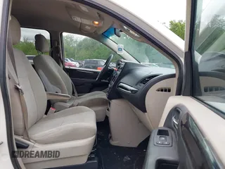 2013 Dodge Grand Caravan SE with VIN 2C4RDGBG8DR505844, listed as a IAAI auction lot 42139152 with 206,399 mi miles and . Bid and sale history available at DreamBid. Image 5.
