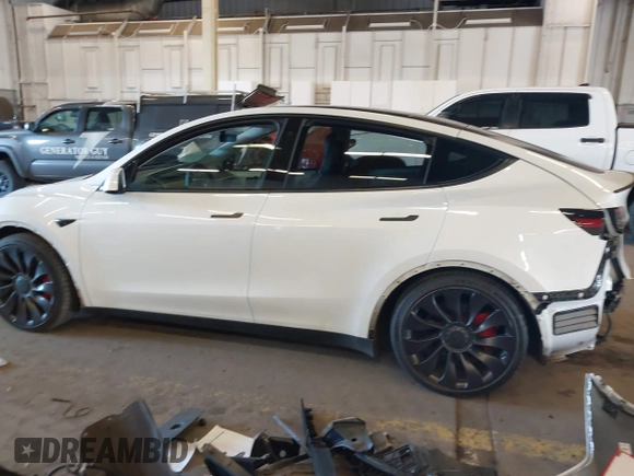 2021 Tesla Model Y Performance with VIN 5YJYGDEF4MF263473, listed as a IAAI auction lot 41851083 with 39,289 mi miles and . Bid and sale history available at DreamBid. Image 15.