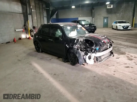 2015 MINI Hardtop 4 Door S with VIN WMWXU3C55F2B62019, listed as a Copart auction lot 46853535 with 124,919 mi miles and Salvage title. Bid and sale history available at DreamBid. Image 14.