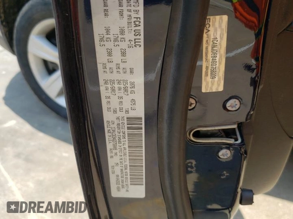 2016 Jeep Compass Latitude with VIN 1C4NJDEB4GD758009, listed as a Copart auction lot 60704745 with 143,393 mi miles and Salvage title. Bid and sale history available at DreamBid. Image 13.