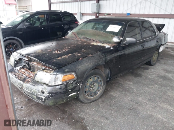 2000 Ford Crown Victoria Police Interceptor z VIN 2FAFP71W4YX199199, wystawiony jako IAAI lot #41610176 z przebiegiem 202 131 mil mil oraz . Historia ofert i sprzedaży dostępna na DreamBid. Obrazek 17.
