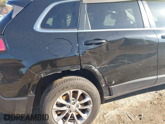 2019 Jeep Cherokee Latitude Plus with VIN 1C4PJMLB2KD261304, listed as a IAAI auction lot 41877500 with 76,442 mi miles and . Bid and sale history available at DreamBid. Image 17.