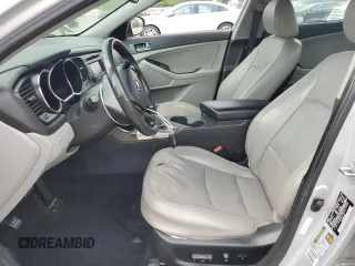 2013 Kia Optima EX z VIN 5XXGN4A79DG217554, wystawiony jako Copart lot #59667065 z przebiegiem 102 482 mil mil oraz Szkoda całkowita • Salvage title. Historia ofert i sprzedaży dostępna na DreamBid. Obrazek 7.