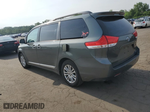 2014 Toyota Sienna XLE z VIN 5TDYK3DC2ES437683, wystawiony jako Copart lot #60549975 z przebiegiem 145 608 mil mil oraz Szkoda całkowita • Salvage title. Historia ofert i sprzedaży dostępna na DreamBid. Obrazek 2.