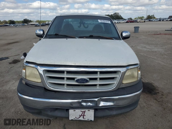 1999 Ford F-150 z VIN 1FTRF17W9XNB67119, wystawiony jako Copart lot #79197414 z przebiegiem Nie podano mil oraz Szkoda całkowita • Salvage title. Historia ofert i sprzedaży dostępna na DreamBid. Obrazek 5.