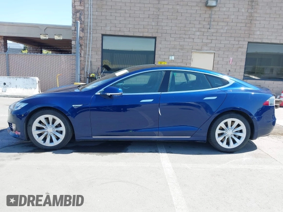 2016 Tesla Model S 90D with VIN 5YJSA1E25GF157220, listed as a IAAI auction lot 42003019 with 130,540 mi miles and . Bid and sale history available at DreamBid. Image 14.