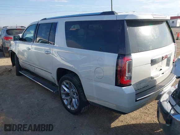 2020 GMC Yukon XL Denali with VIN 1GKS1HKJ6LR282854, listed as a IAAI auction lot 41717072 with 56,715 mi miles and . Bid and sale history available at DreamBid. Image 3.