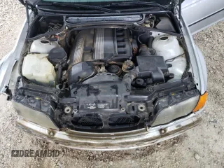 2000 BMW 3 Series 323i with VIN WBAAM3348YFP73443, listed as a Copart auction lot 54165575 with 334,761 mi miles and Salvage title. Bid and sale history available at DreamBid. Image 11.