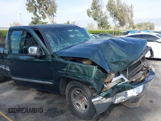 2002 GMC Sierra 1500 SLE z VIN 2GTEC19V121150546, wystawiony jako IAAI lot #40974798 z przebiegiem Nie podano mil oraz . Historia ofert i sprzedaży dostępna na DreamBid. Obrazek 17.
