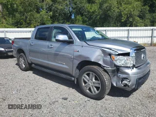 2012 Toyota Tundra 4WD Truck LTD with VIN 5TFHY5F15CX238124, listed as a Copart auction lot 69297994 with 165,591 mi miles and Salvage Title. Bid and sale history available at carsss.com. Image 4.