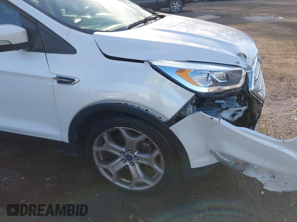 2017 Ford Escape Titanium with VIN 1FMCU9J98HUA04994, listed as a IAAI auction lot 41139988 with 136,989 mi miles. Bid and sale history available at carsss.com. Image 17.